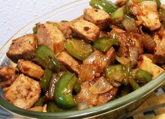 Πικάντικη Κρητική Τηγανιά… Έτοιμη Πικάντικη Κρητική Τηγανιά σε πιάτο, γαρνιρισμένη με φρέσκο μαϊντανό.