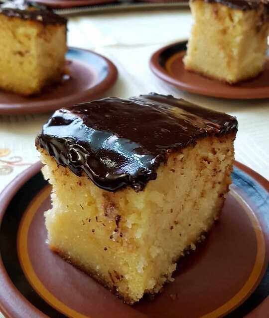 71709967_543045086515627_1025000855792779264_n Σιροπιαστή Γιαουρτόπιτα με Πορτοκάλι, κομμένη σε κομμάτια.