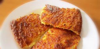 Κολοκυθόπιτα με κίτρινη κολοκύθα χωρίς φύλλο (της Ιωάννας) Χρυσαφένια κολοκυθόπιτα χωρίς φύλλο, κομμένη σε τετράγωνα κομμάτια, σερβιρισμένη.