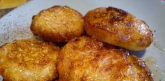 Τηγανίτες Πορτοκαλιού, ζεστές, περιχυμένες με θυμαρίσιο μέλι και πασπαλισμένες με κανέλα.