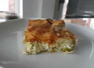 Σπιτική μαρμελάδα καρότο-μήλο σε γυάλινο βάζο, με κομμάτια φρούτων και λαχανικών, πλαισιωμένη από φρέσκα μήλα, καρότα και ένα ξυλάκι κανέλας.