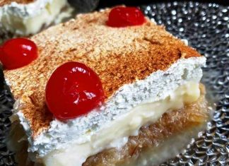 Κομμάτι από εκμέκ κανταΐφι, που δείχνει τις στρώσεις του τραγανού κανταϊφιού, της κρέμας και της σαντιγί.