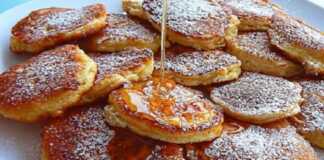 Μηλοτηγανίτες…Δοκιμάστε τις! Στοίβα από χρυσαφένιες μηλοτηγανίτες πασπαλισμένες με άχνη ζάχαρη και κανέλα, γαρνιρισμένες με ρευστό μέλι