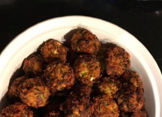 Οι πιο τραγανιστοί κολοκυθοκεφτέδες Πιάτο με χρυσαφένιους, τραγανούς κολοκυθοκεφτέδες, γαρνιρισμένους με φρέσκο άνηθο, έτοιμους για σερβίρισμα.