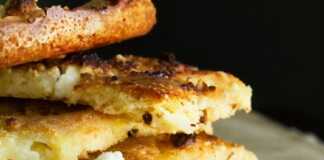 Ένα κομμάτι χρυσαφένιας μπατζίνας σε ένα ταψ