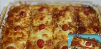 Πατάτες με Κιμά στον Φούρνο, σερβιρισμένες με τυρί.