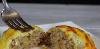 Zουμερ;o Μπιφτέκι με λάχανο, ροδοκοκκινισμένα, με λιωμένο τυρί από πάνω.