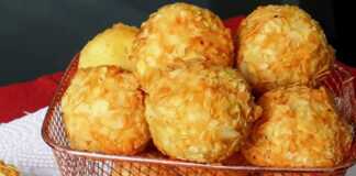 Πιατέλα γεμάτη με χρυσαφένιες Κροκέτες Πατάτας με Μοτσαρέλα και Αμύγδαλο, έτοιμες για σερβίρισμα