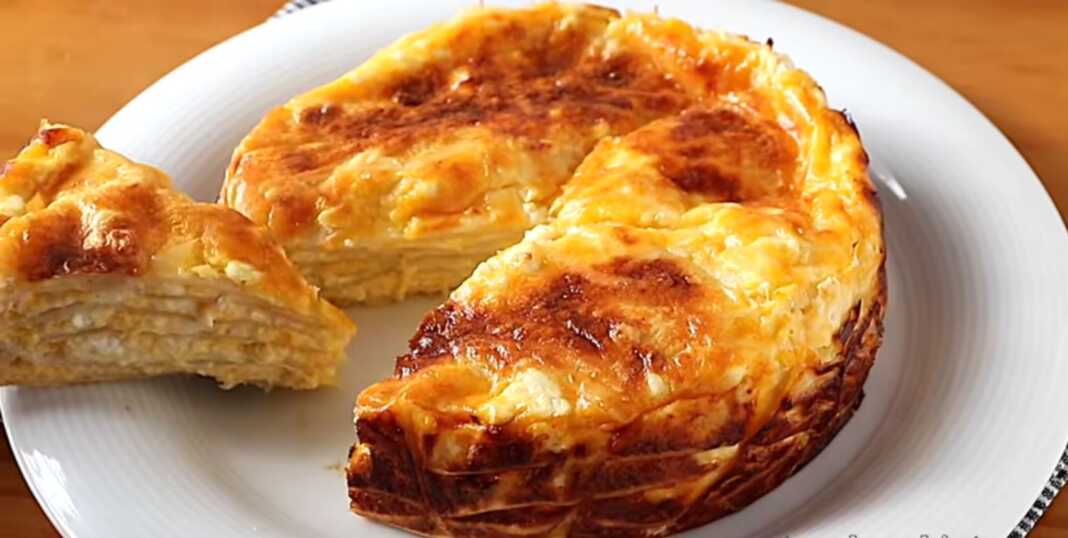 almiri tortigia Πίτα με τορτίγιες στο ταψί, φρεσκοψημένη με χρυσαφένια κρούστα.