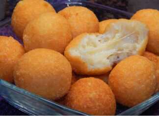 Κοντινό πλάνο σε μια Τυροκροκέτα Τραγανή, με το λιωμένο τυρί να ξεχειλίζει