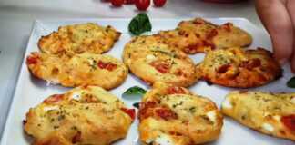 Αφράτα, σπιτικά τυρόψωμα με ντομάτα, φέτα και ρίγανη σε ταψί