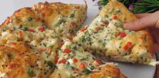 Το Τυρόψωμο του καλοκαιριού Φρεσκοψημένο, χρυσαφένιο τυρόψωμο, κομμένο σε φέτες, με τυρί να φαίνεται μέσα στην αφράτη ζύμη.