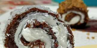 “Σουτζούκ Λουκούμ” με σοκολάτα και σαντιγί Ένα ορθογώνιο ταψί με στρώσεις σοκολατένιας κρέμας και λευκής σαντιγί, πασπαλισμένο με καρύδα και καρύδι, κομμένο σε λωρίδες που ρολάρονται.