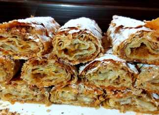 Γλυκιά κολοκυθόπιτα σε ρολά, πασπαλισμένη με άχνη ζάχαρη και κανέλα.