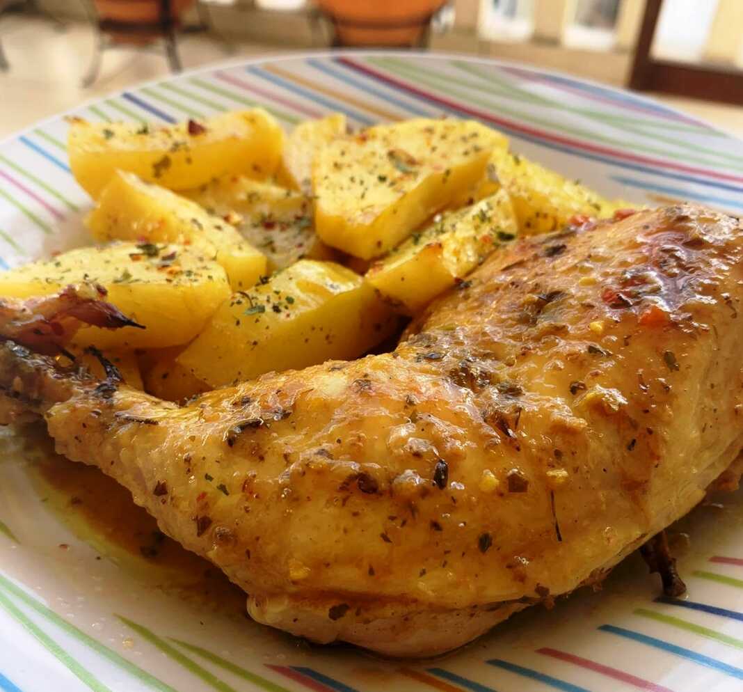 Κοτόπουλο στο φούρνο με πατάτες και πορτοκάλι