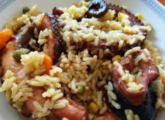 Παραδοσιακό χταπόδι με ρύζι πιλάφι στην κατσαρόλα αρωματισμένο με δάφνη και γαρύφαλλο