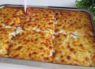 να ταψί με λαχταριστό Κοτόπουλο Ογκρατέν βγαλμένο από τον φούρνο