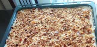 Ένα κομμάτι σουλτάν κανταΐφι που δείχνει τις στρώσεις: το σιροπιασμένο καταΐφι στη βάση, μια παχιά στρώση κρέμας, μια στρώση λευκής σαντιγί και καβουρδισμένα αμύγδαλα στην κορυφή.