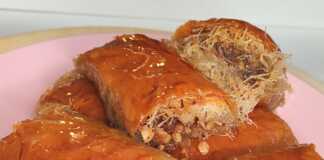 Πιάτο με χρυσαφένιο Γιαννιώτικο Κανταΐφι, σιροπιαστό και πασπαλισμένο με ξηρούς καρπούς.