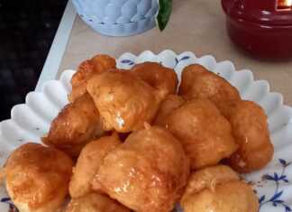 Χρυσαφένιοι αφράτοι λουκουμάδες από ρύζι περιχυμένοι με πλούσιο μέλι και πασπαλισμένοι με κανέλα