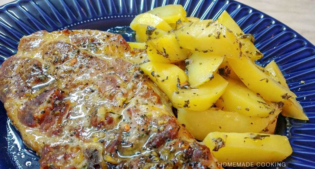 χοιρινές μπριζόλες με πατάτες