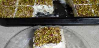 Εκμέκ κανταΐφι με σαντιγί και φυστίκι Αιγίνης, σερβιρισμένο σε κομμάτι.