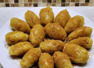 Ζεστός Χαλβάς με Αλεύρι σε πιάτο, πασπαλισμένος με κανέλα, έτοιμος για σερβίρισμα