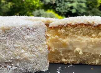 Κέικ Καρύδας με κρέμα Το τελειωμένο **Κέικ Καρύδας με Κρέμα** πασπαλισμένο με τριμμένη καρύδα.