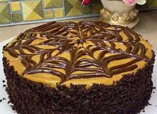 Τούρτα κέικ με κρέμα Dulce de Leche και γκανάς σοκολάτας γάλακτος.