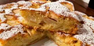 Η **Αφράτη Μηλόπιτα** σε πιατέλα, πασπαλισμένη με ζάχαρη άχνη.