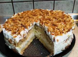 Εντυπωσιακή τούρτα αμυγδάλου διακοσμημένη με γκαρνί και καβουρδισμένο αμύγδαλο φιλέ.