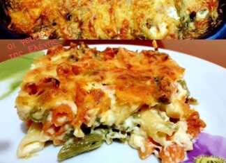 Ταψί με πέννες τρικολόρε καλυμμένες με λιωμένα τυριά στο φούρνο.