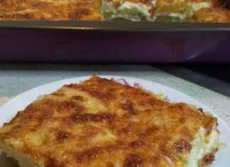 Κοντινό πλάνο στις στρώσεις του τυριού και των πατατών στις Πατάτες Ογκρατέν