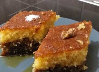 Πιάτο με κομμάτι Ραβανί-Καρυδόπιτα, σιροπιαστό, πασπαλισμένο με κανέλα ή ινδοκάρυδο, έτοιμο για απόλαυση.