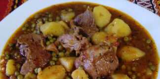 Μοσχαράκι κοκκινιστό με αρακά καροτάκια και πατάτες