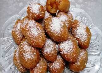 Σειρά από λευκά μεθυσμένα πασπαλισμένα με ινδοκάρυδο και γεμισμένα με πολύχρωμα λουκουμάκια πάνω σε πιατέλα