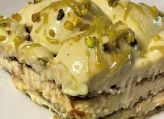 Τιραμισού με στρώσεις από σαβαγιάρ, κρέμα μασκαρπόνε-φιστικιού και γαρνιρισμένο με θρυμματισμένο φυστίκι Αιγίνης και κρέμα φιστικιού.