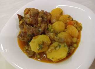 Βοδινή ουρά με αρακά και πατάτες