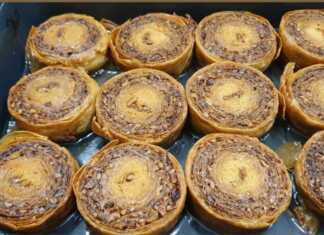 Φρεσκοψημένο σαραγλί με κανταΐφι, πλούσια σιροπιασμένο, σερβιρισμένο σε δίσκο, με ορατή την τραγανή του υφή.