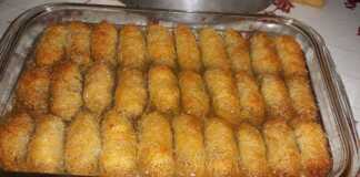 Το τελικό **Κανταΐφι με Καρύδια** σιροπιασμένο και πασπαλισμένο με τριμμένο καρύδ