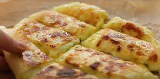 Τυρόπιτα με Πατάτες και Μοτσαρέλα, κομμένη και ζεστή.