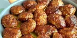 Τηγανητοί λαχανοκεφτέδες με κιμά, χρυσαφένιοι και τραγανοί, σερβιρισμένοι σε πιατέλα.