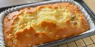 Κέικ σε 5 λεπτά Δίχρωμο κέικ σοκολάτας και καφέ σε μακρόστενη φόρμα, πασπαλισμένο με κομματάκια σοκολάτας.