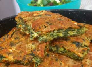 Χρυσαφένια, αφράτη μπατζίνα χωρίς φύλλο, κομμένη σε τετράγωνα κομμάτια, με πράσινη γέμιση από σπανάκι και φέτα.