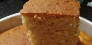 Σπιτικό κέικ βανίλιας-πορτοκαλιού σε ταψί, με χρυσαφένιο χρώμα.