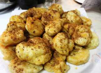 Λαγγίτες Αφράτες, Μελωμένες με Κανέλα Μια πιατέλα γεμάτη χρυσαφένιες, τηγανισμένες λαγγίτες, περιχυμένες με μέλι και πασπαλισμένες με κανέλα.