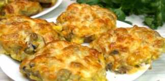 Μπιφτέκια Γεμιστά με Μανιτάρια και Τυρί Ένα πιάτο με λαχταριστά, ολόχρυσα μπιφτέκια, γεμιστά με μανιτάρια και καλυμμένα με λιωμένο, ροδοκοκκινισμένο τυρί.