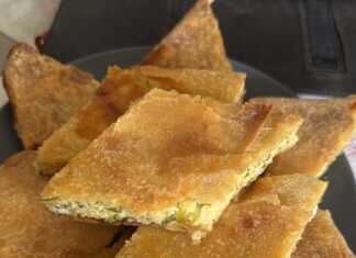 Κομμάτια από Αλμυρή Κολοκυθόπιτα σε πιάτο, που αναδεικνύουν το τραγανό φύλλο και την πλούσια γέμιση