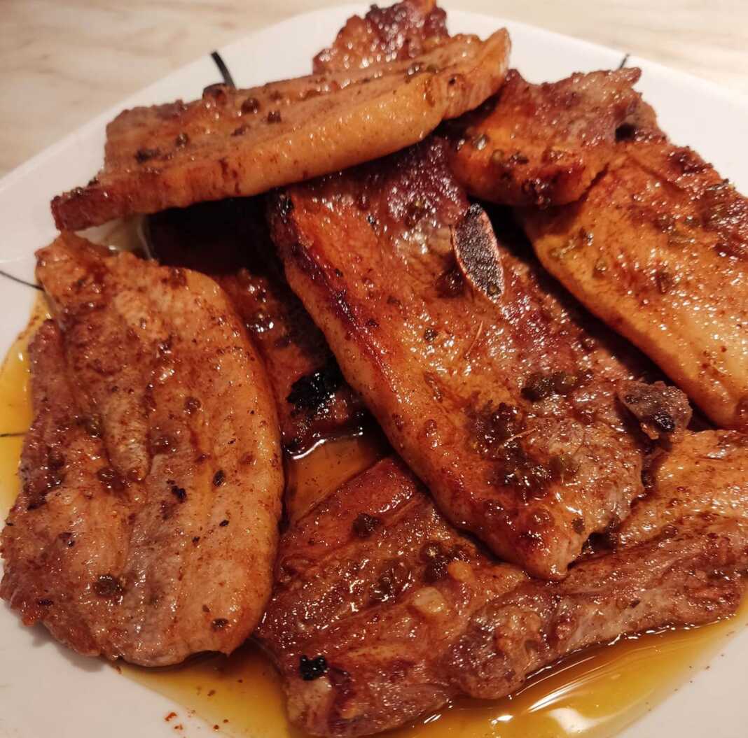 pansetes krasates Πιάτο με χρυσαφένιες, ζουμερές Πανσέτες Κρασάτες, με ελαφρά καμένη επιφάνεια.