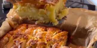 Αφράτη πίτα με τυρί και μήλο, φρεσκοψημένη σε στρογγυλή φόρμα